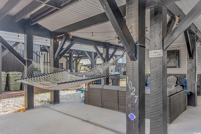 view of home's community with outdoor lounge area and a patio