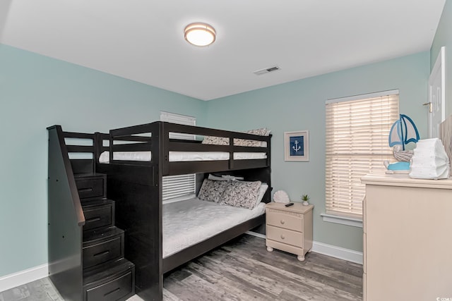 bedroom featuring hardwood / wood-style floors