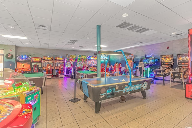 playroom with pool table and a drop ceiling