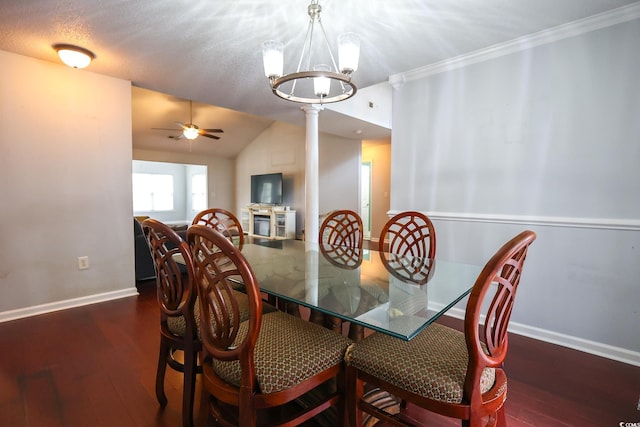 dining space with lofted ceiling, a textured ceiling, ornamental molding, dark hardwood / wood-style flooring, and ceiling fan with notable chandelier