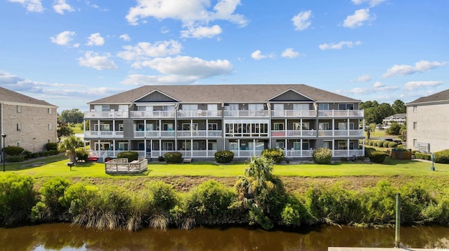 view of property with a water view