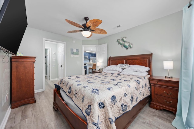 bedroom featuring ceiling fan and light wood-type flooring