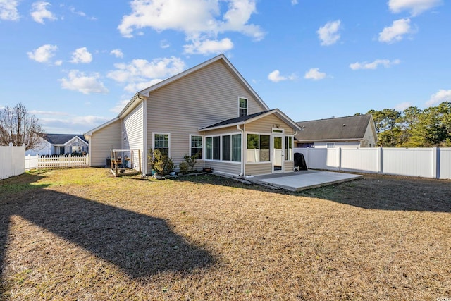 4821 Southgate Pkwy, Myrtle Beach, SC 29579 - rear view of house with a patio and a sunroom