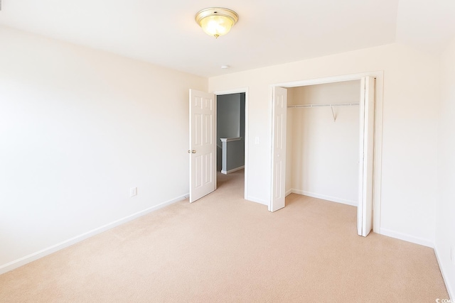4821 Southgate Pkwy, Myrtle Beach, SC 29579 - unfurnished bedroom with light colored carpet, a closet, and baseboards