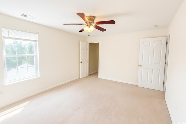 4821 Southgate Pkwy, Myrtle Beach, SC 29579 - empty room featuring light carpet, ceiling fan, baseboards, and a smoke detector