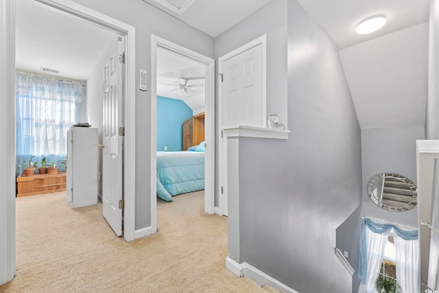 4821 Southgate Pkwy, Myrtle Beach, SC 29579 - hallway featuring an upstairs landing, carpet, lofted ceiling, and baseboards