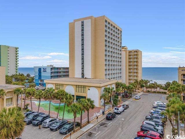 view of building exterior featuring a water view