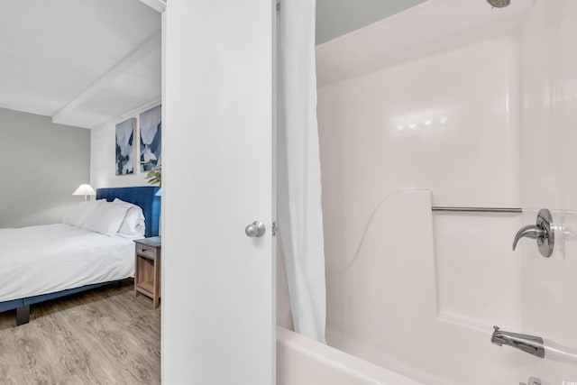 bathroom with hardwood / wood-style floors