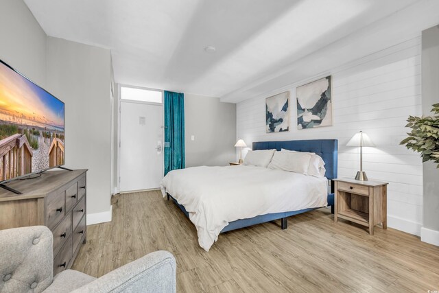 bedroom with light wood-type flooring