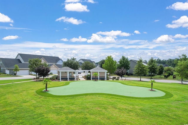 view of property's community featuring a gazebo and a yard