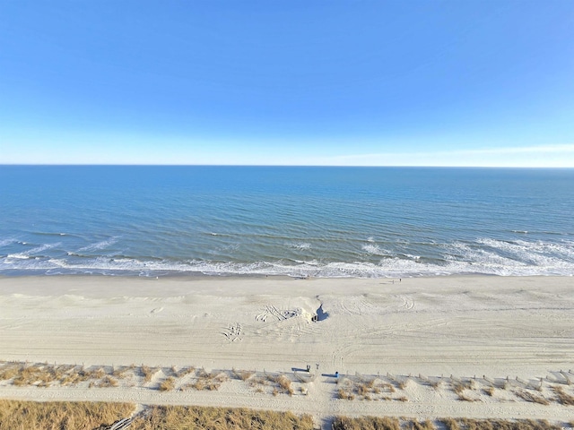 property view of water featuring a beach view