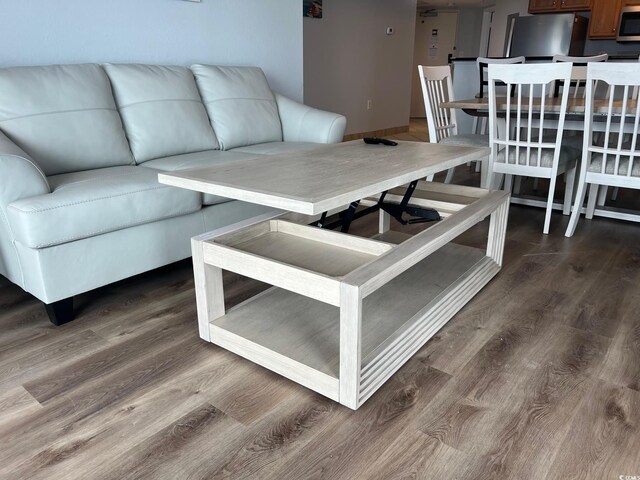 living area featuring dark wood-style flooring