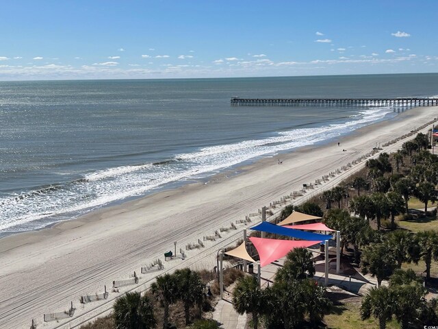 bird's eye view featuring a beach view and a water view