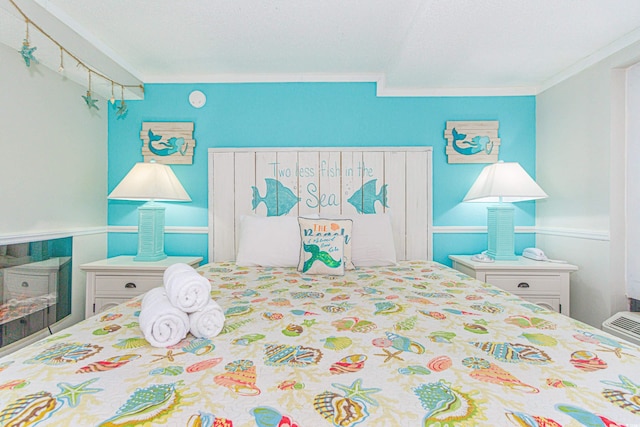 bedroom with crown molding