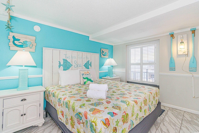 bedroom featuring crown molding and a textured ceiling