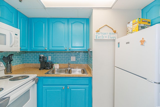 kitchen featuring blue cabinetry, sink, a paneled ceiling, white appliances, and decorative backsplash