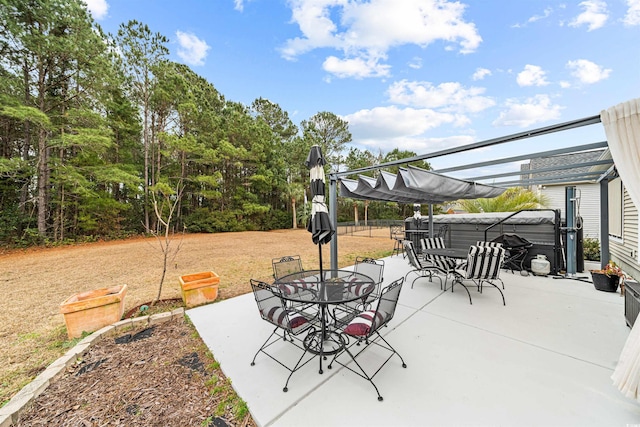 view of patio / terrace featuring a pergola and a hot tub