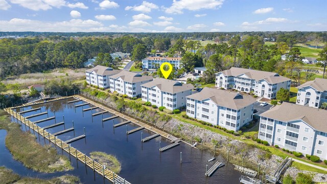 drone / aerial view with a water view