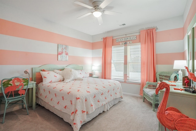 bedroom with ceiling fan and light colored carpet