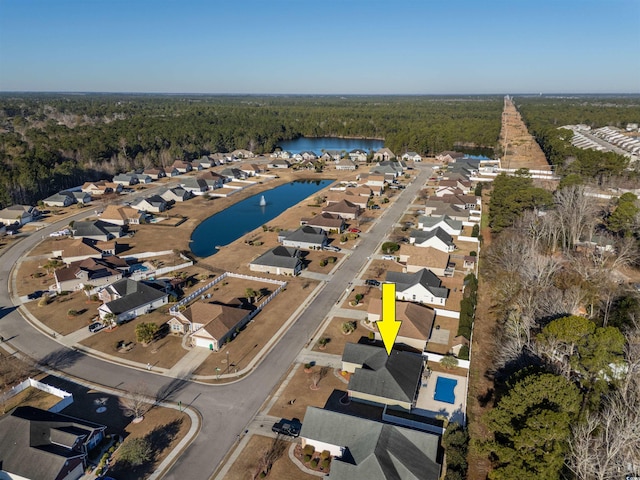 drone / aerial view with a water view