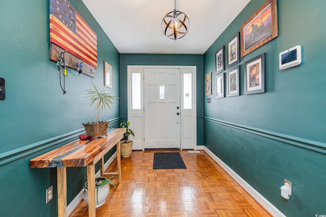 entrance foyer with light parquet floors