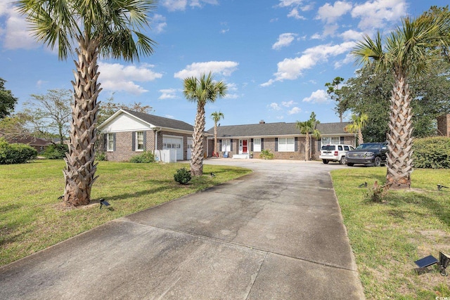 ranch-style house with a garage and a front lawn