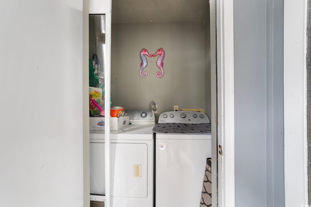 laundry area featuring washing machine and dryer