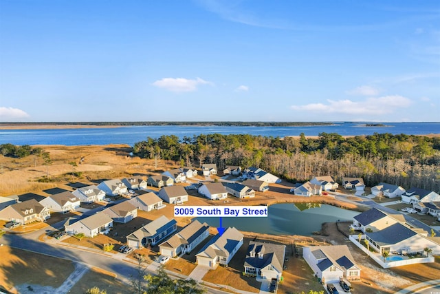 drone / aerial view featuring a water view