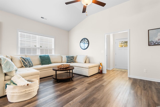 living room with wood-type flooring, vaulted ceiling, and ceiling fan