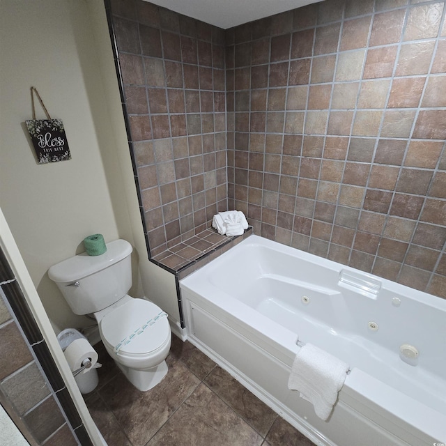 bathroom featuring shower / washtub combination and toilet