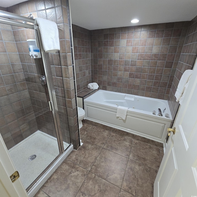 bathroom featuring independent shower and bath, tile walls, tile patterned floors, and toilet