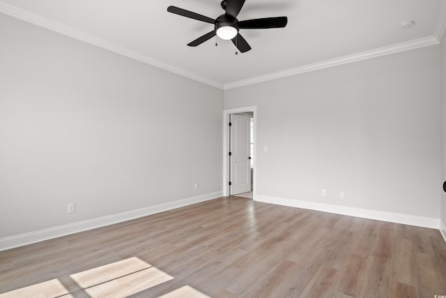 1201 Possum Trot Rd, North Myrtle Beach, SC 29582 - empty room featuring ornamental molding, ceiling fan, light wood-type flooring, baseboards, and a smoke detector
