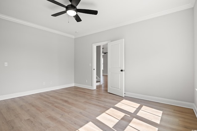 1201 Possum Trot Rd, North Myrtle Beach, SC 29582 - unfurnished bedroom with crown molding, light wood-style flooring, baseboards, and ceiling fan