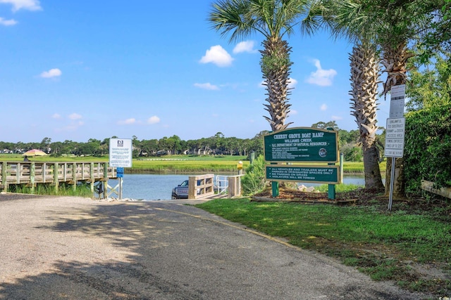 1201 Possum Trot Rd, North Myrtle Beach, SC 29582 - view of property's community featuring a water view and a boat dock