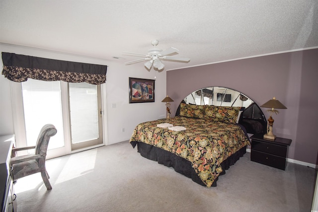 carpeted bedroom with crown molding, ceiling fan, and a textured ceiling