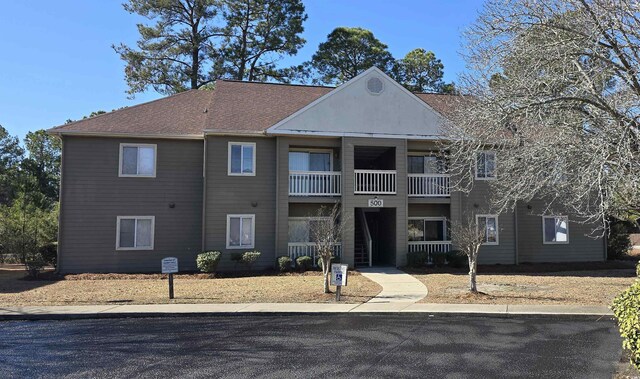 exterior space featuring a balcony