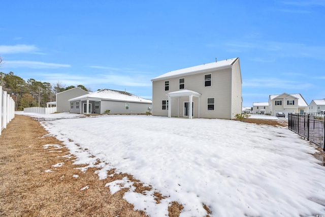 view of snow covered property