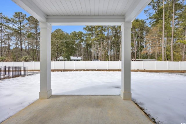 view of snow covered patio