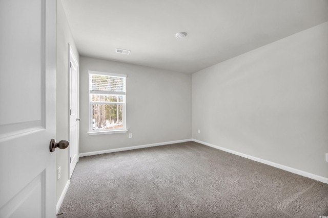 empty room featuring carpet