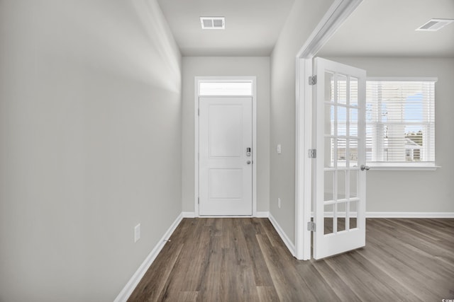 interior space with dark hardwood / wood-style floors