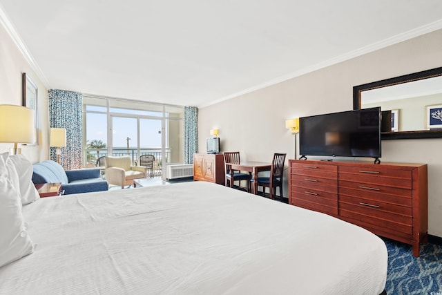 bedroom with crown molding, floor to ceiling windows, and radiator