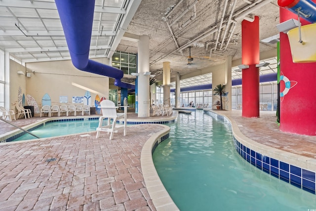 view of pool featuring a patio area