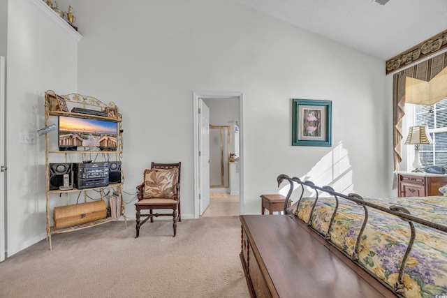 bedroom with light carpet and high vaulted ceiling