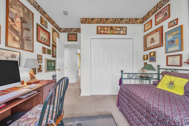 bedroom featuring a closet and carpet