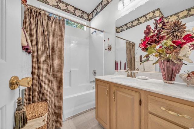 bathroom featuring vanity, tile patterned flooring, and shower / bath combo with shower curtain