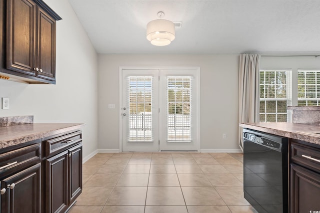 kitchen with dishwasher, dark brown cabinets, and light tile patterned floors