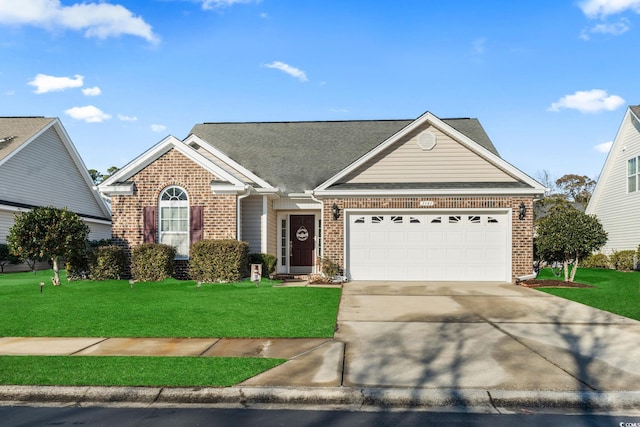 view of front of property featuring a garage and a front lawn