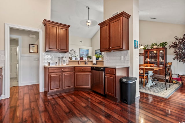 kitchen featuring high vaulted ceiling, decorative backsplash, stainless steel dishwasher, and dark hardwood / wood-style floors