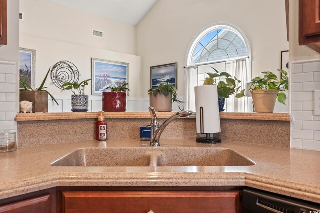 details featuring dishwasher and sink