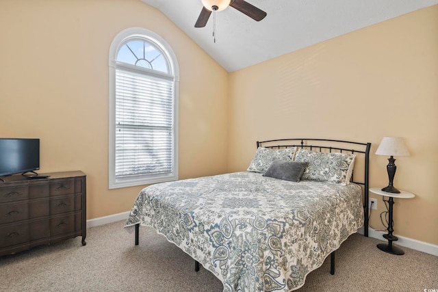 carpeted bedroom featuring vaulted ceiling and ceiling fan